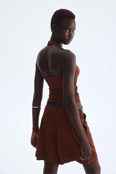 H&M صدرية بدون ياقة