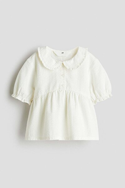 H&M بلوزة ببلوم