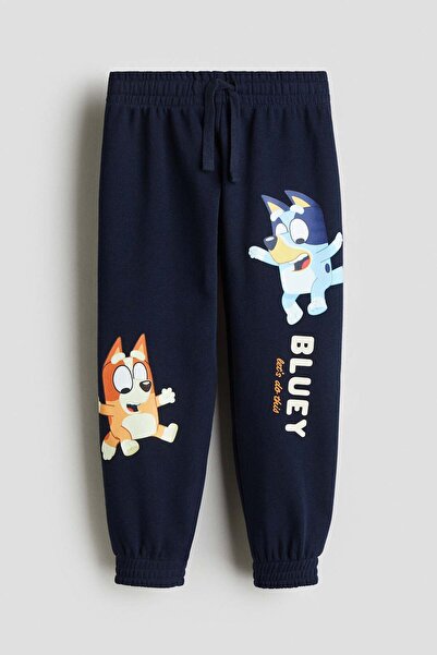 H&M بنطال رياضي بتفاصيل نقوش