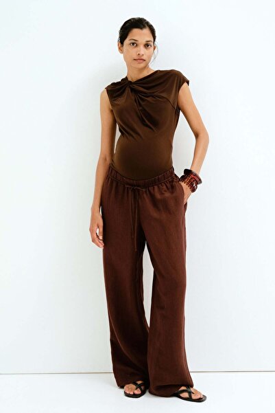 H&M بنطلون من مزيج الكتان قبل وبعد MAMA