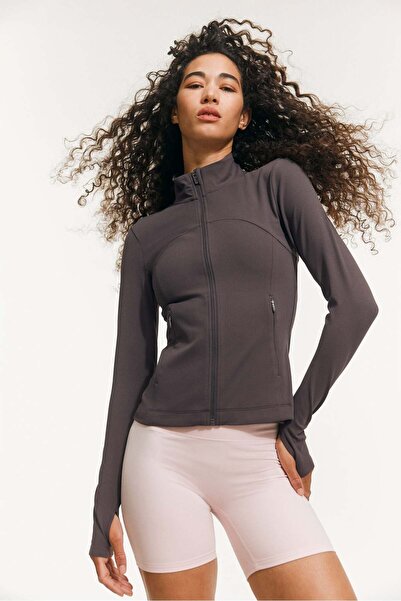 H&M سترة رياضية بسحاب من SoftMove™