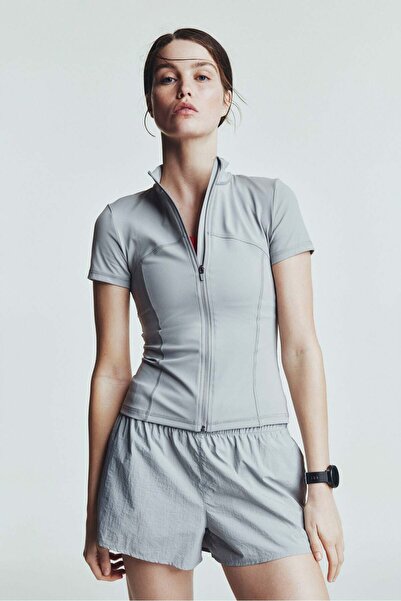 H&M سترة جري بأكمام قصيرة مع ShapeMove™