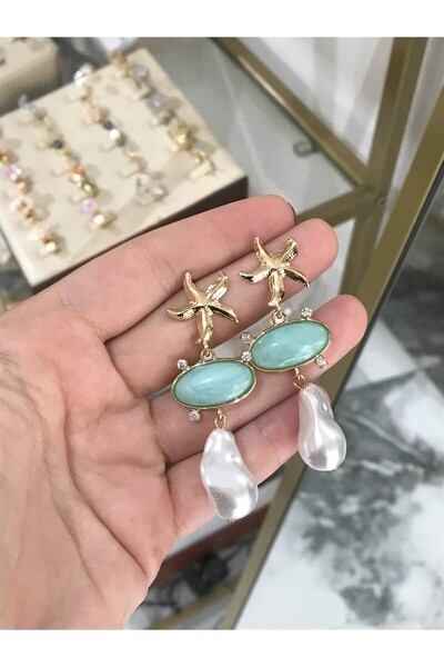 the ASEL İNCİ أقراط بتفاصيل نجم البحر واللؤلؤ باللون الفيروزي