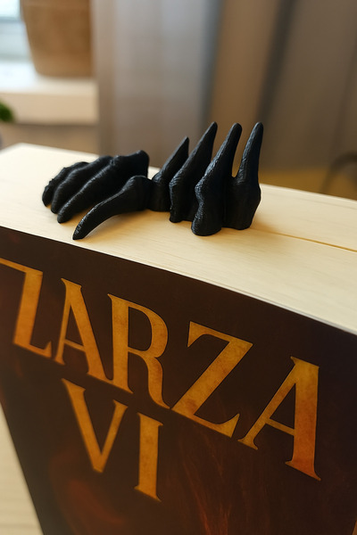 Muvesta علامة كتب ثلاثية الأبعاد بتصميم مخلب