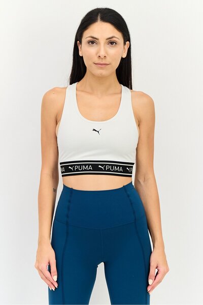 Puma حمالة صدر رياضية مبطنة بشعار العلامة التجارية للنساء، لون أبيض عاجي