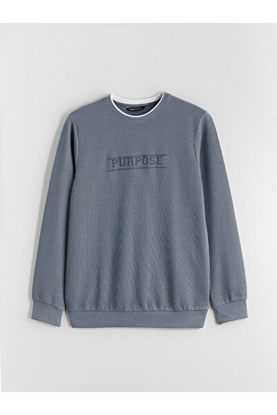 LC Waikiki سويت شيرت رجالي مطبوع برقبة دائرية باللون الأزرق