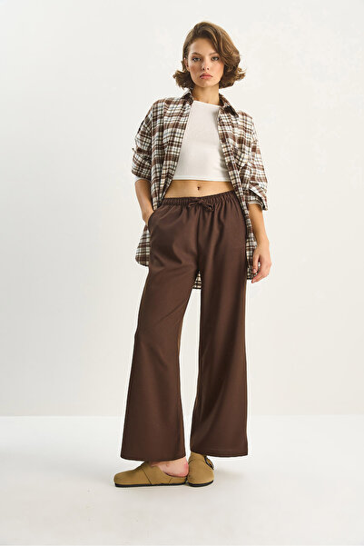 Bianco Lucci Women's High Waist Elastic Waist Tie Detail Pocket Fabric Loose Pants 4031 60283636