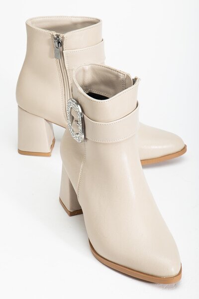 Dilimler Ayakkabı Бежеві жіночі черевики на товстому каблуці з металевою пряжкою та гострим носком