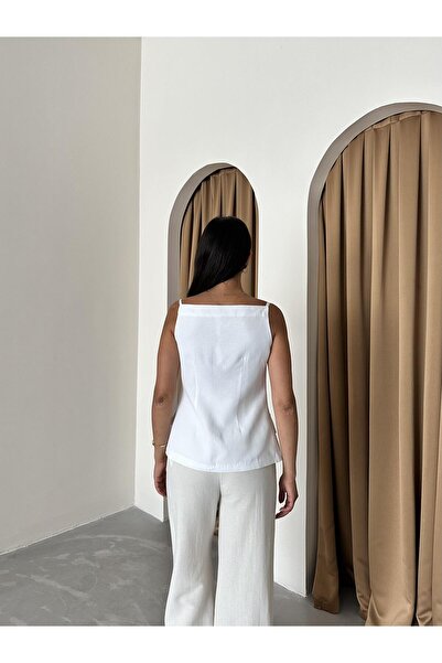 Laluvia Weiße Weste aus 100 % Baumwolle mit dünnen Trägern, Taschen und Knopfdetails