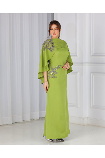 NAN Apple green dress with embellishments on the shoulder and waist