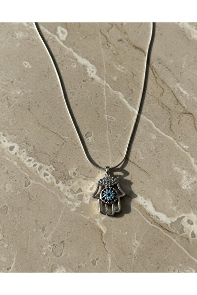 Kokoş İşler Fatma’nın eli Çelik kolye