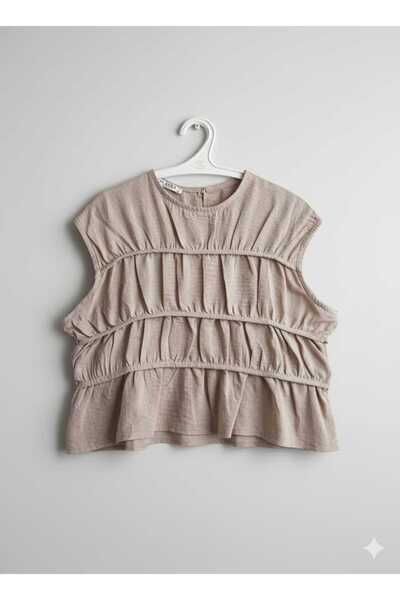 MODA BEJ BÜZGÜ DETAY KOLSUZ BLUZ