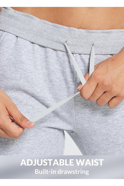 OEM Women's breathable sports pants, with pockets and drawstring at the waist, Grey M