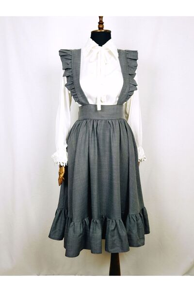 Sihirli Düğmeler تنورة معلقة