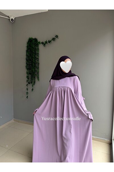 Yüsra Collection Ravda Elbise este o Tesettür Ferace.