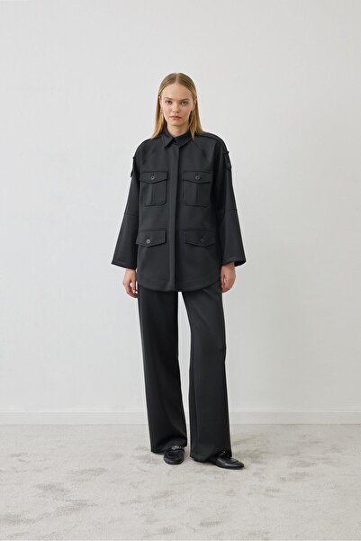 TERZİ DÜKKANI بدلة محبوكة بتفاصيل جيب من زين باللون الأسود