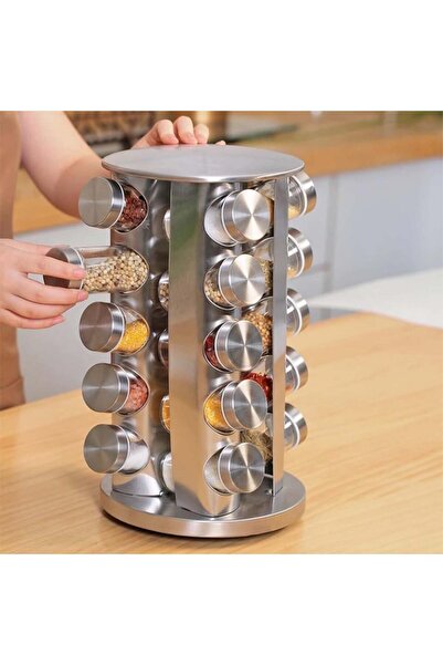 Un منظم رف دوار منظم للتوابل والبهارات مع 20 علبة زجاجية فضي