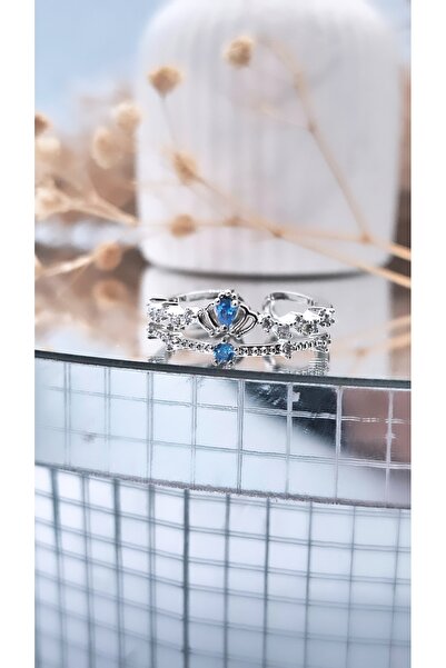 Serenity خاتم مطلي بالفولاذ مع شكل تاج صغير من حجر الزركون الأزرق