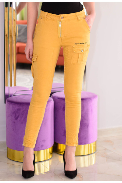 Elis Fashion Γυναικεία μουσταρδί στενά τζιν με μεσαία μέση και τσέπες patch.