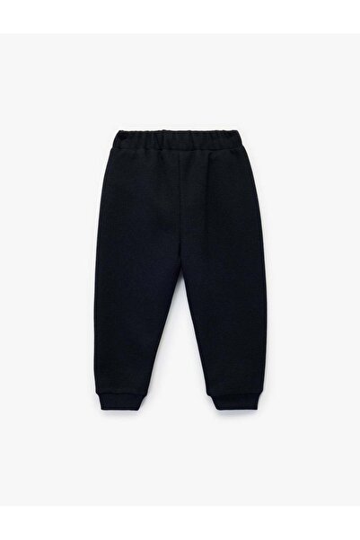 Koton Button Detailed Pocketed Basic Pants with Elastic Waist, Sweatpants Look