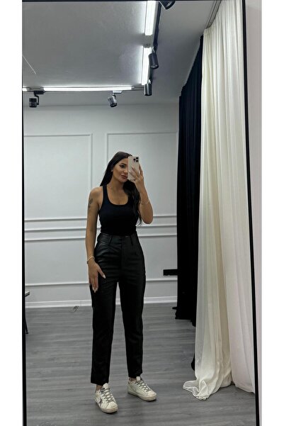 Daves Černé kožené kalhoty s detaily na knoflíky a semišovým vnitřkem ve stylu mrkvového střihu