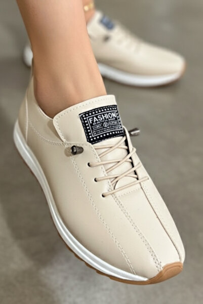 Ekonomik Ayakkabı حذاء رياضي نسائي كاجوال باللون البيج – خفيف ومريح، تصميم كامل