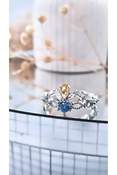 Serenity خاتم مطلي بالفولاذ مع شكل تاج كبير من حجر الزركون الأزرق