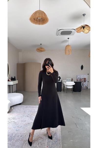 Buket Teke Черна рокля с отвор отгоре