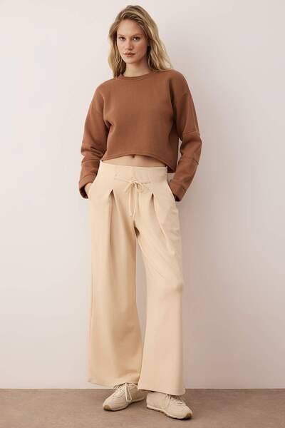 Trendyol Collection Taş Wide Leg Soft Fabric Pleated Stretchy Knitted Trousers Twoaw26Pl00138