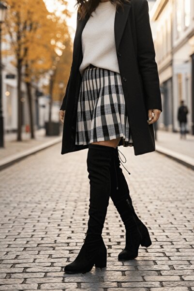 DİVOLYA Jessica Чорні еластичні чобітки з круглим носком і товстим каблуком вище коліна