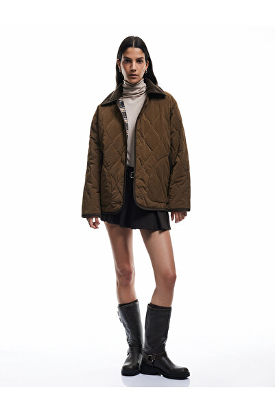 Koton Prošívaná bunda s dlouhým rukávem a klasickým límcem s kapsami na patentky