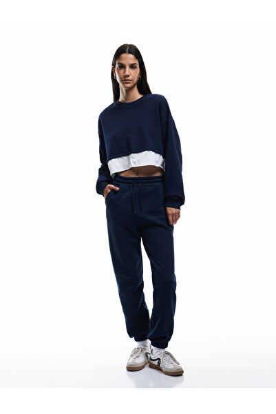 Koton Marineblaue Damen-Jogginghose mit Taschen und Schnürung an der Taille 6...