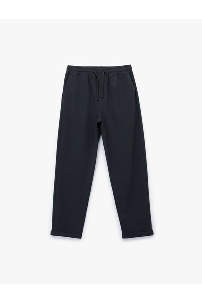 Koton Viscose Blended Pocket Detailed Textured Waist Lace-Up Trousers