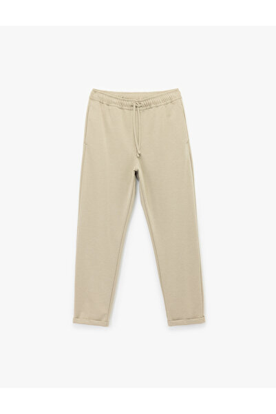 Koton Straight Fit Pike Kumaş Cep Detaylı Rahat Kesim Beli Bağcıklı Pantolon