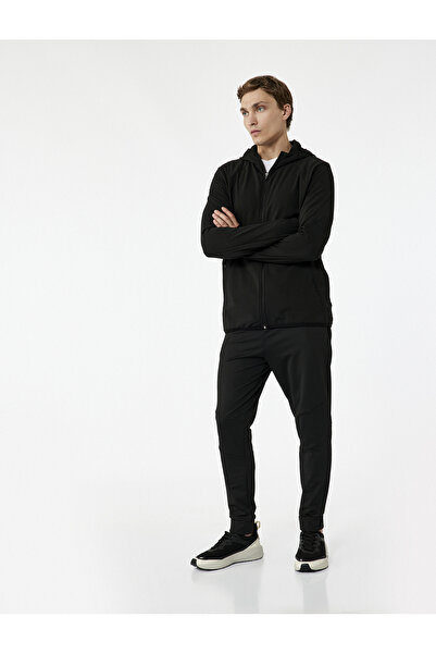 Koton Sportovní tepláky Jogger s kapsami na zavazování v pase a detaily prošívání