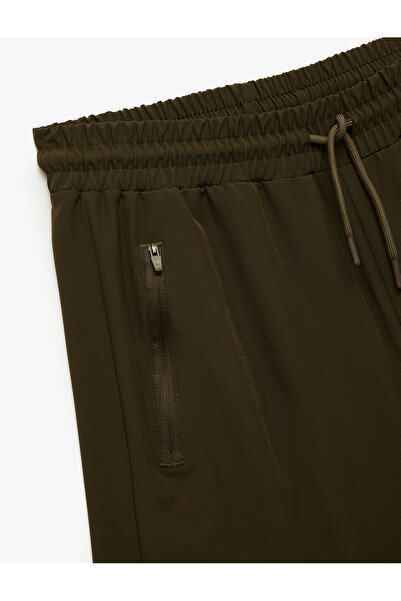 Koton Fermuarlı Cep Detaylı Beli Bağcıklı Paraşüt Spor Şort