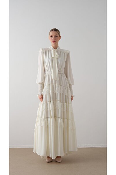 miha Hicran Önal تنورة طويلة مطوية ومربوطة باللون البني