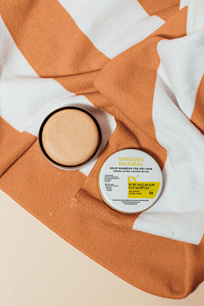 unique and natural شامبو صلب للشعر الجاف 100 جرام