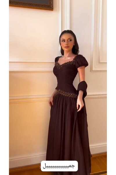 NALA FASHION A very elegant dress with a luxurious oriental style