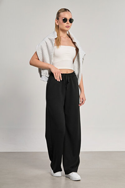 BARRELS AND OIL بنطلون واسع الساق من المودال مع خصر مطاطي - أسود