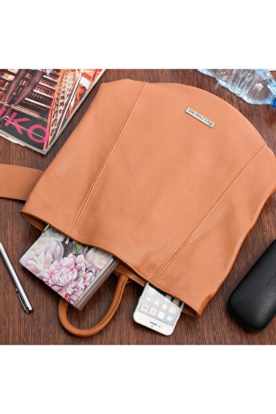 Other Women's leather backpack, elegant and fashionable for work