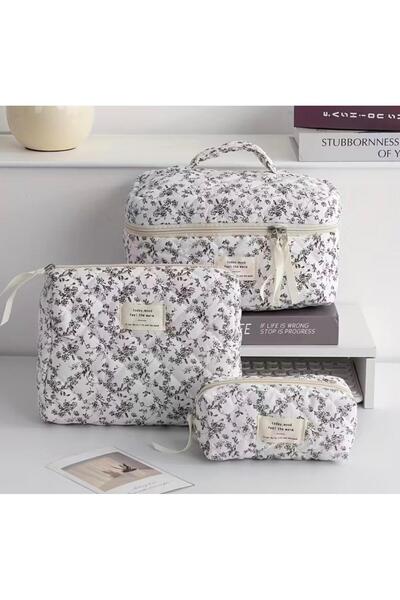 Burroe Atalier مجموعة من 3 حقائب مكياج أو منظمات ذات نمط زهور سوداء على خلفية...