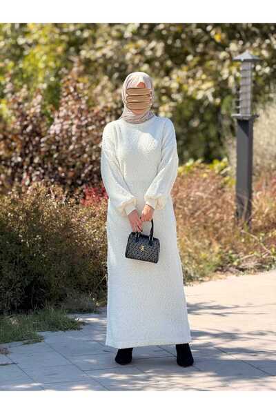 Nissra فستان تريكو كبير الحجم من تصميم أنكانور ANKA252003