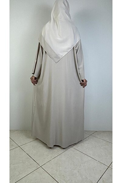 REİNA Light beige linen abaya with matte gold accessories and a shawl