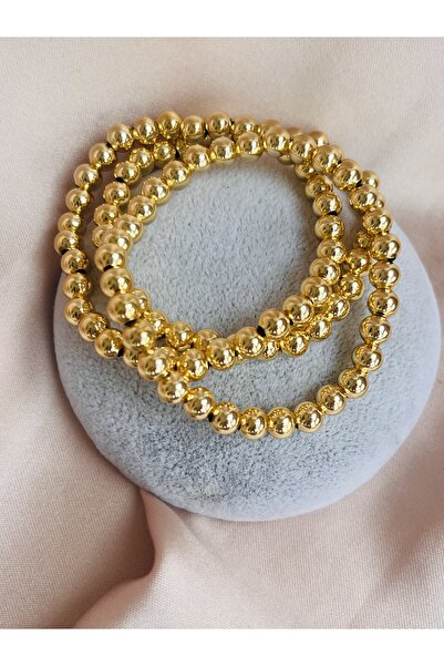 COCOSH TAKI سوار مطاطي متعدد الألوان مزين بالخرز الذهبي