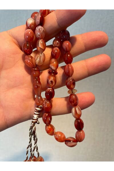 Mucemi System Tassel 8*12 Mm. Almond Cut Red Color Crimped Amber Prayer Beads