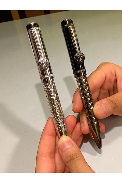 NEW STYLE A set of elegant and modern ballpoint pens with lion-shaped decorations and clips for those who love distinction.