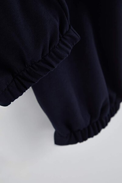 Trendyol Collection Navy Blue Straight Cut Elasticated Leg Plus Size Sweatpants Tmnss24Aj00001