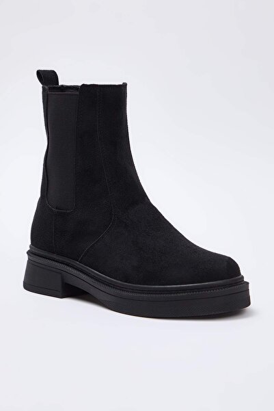 TRENDYOL SHOES Černé semišové dámské boty Chealsea s plochou podrážkou TAKAW26BO00085