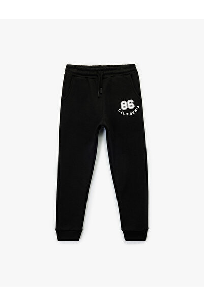 Koton Baskılı Beli Bağcıklı Cep Detaylı Şardonlu Jogger Eşofman Altı